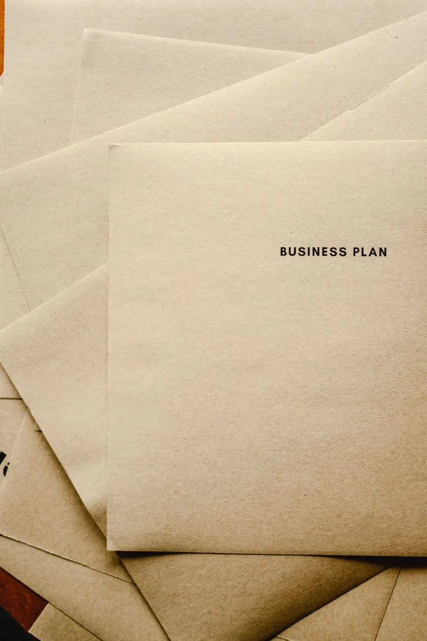 A close-up of a business envelope in a minimalist office setup.