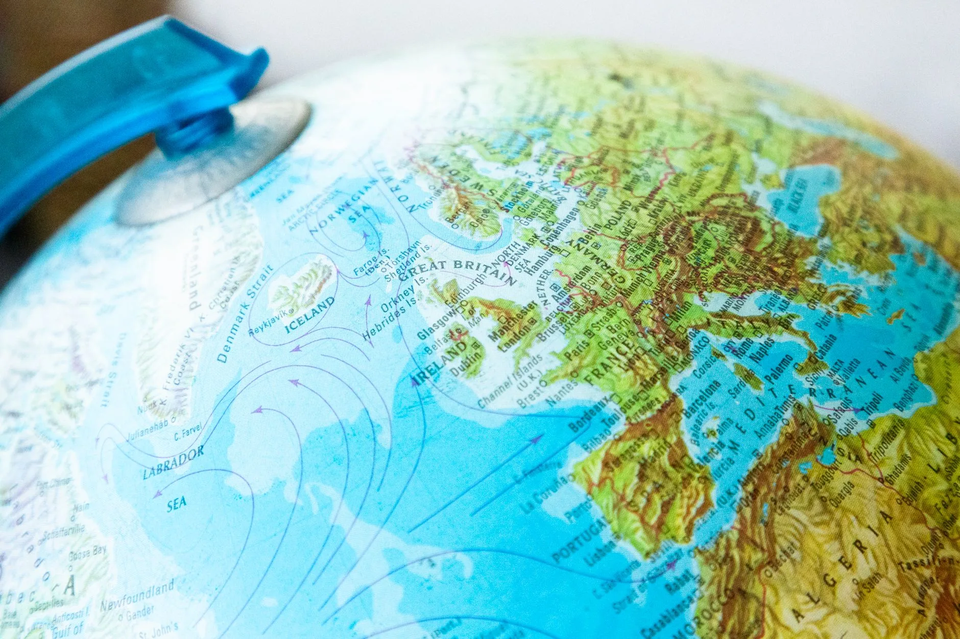 A close-up view of a world globe focused on Europe.