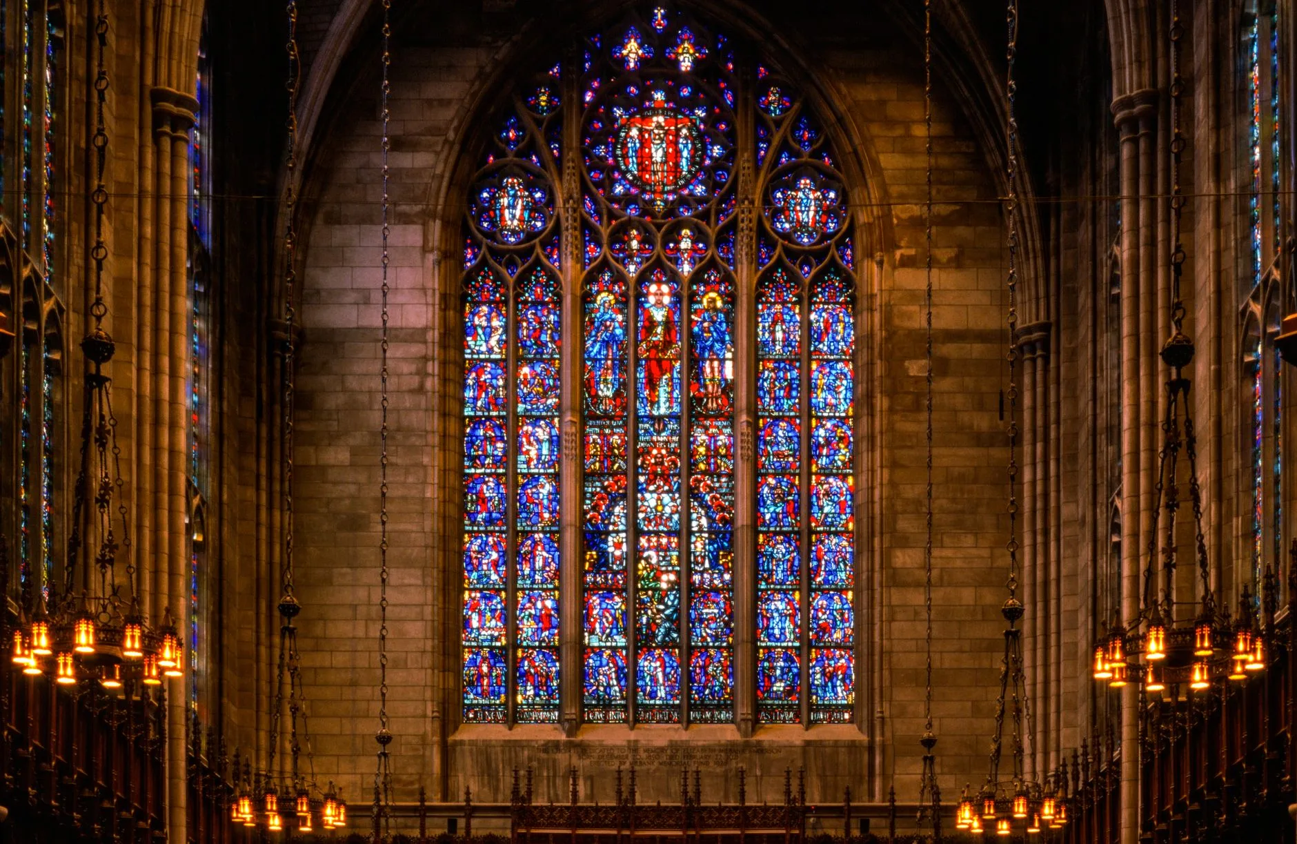 A stunning stained glass window in a Gothic church.