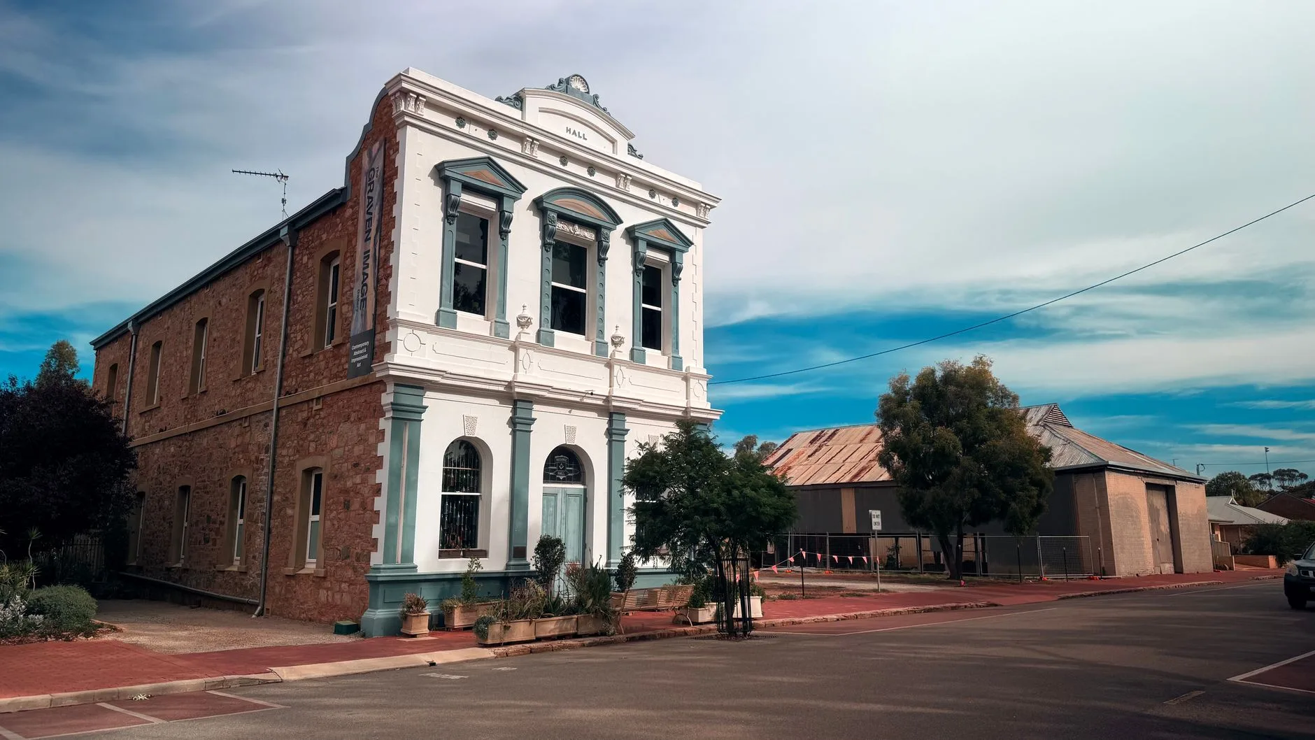 A historic town hall building in a small village.